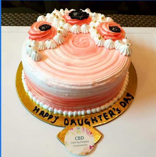 Strawberry Cake With Choco chip Filling. This toothsome strawberry rose is a divine dessert filled with rich strawberry cream and crushed strawberries. With roses carved on its contours and strawberry cream icing.