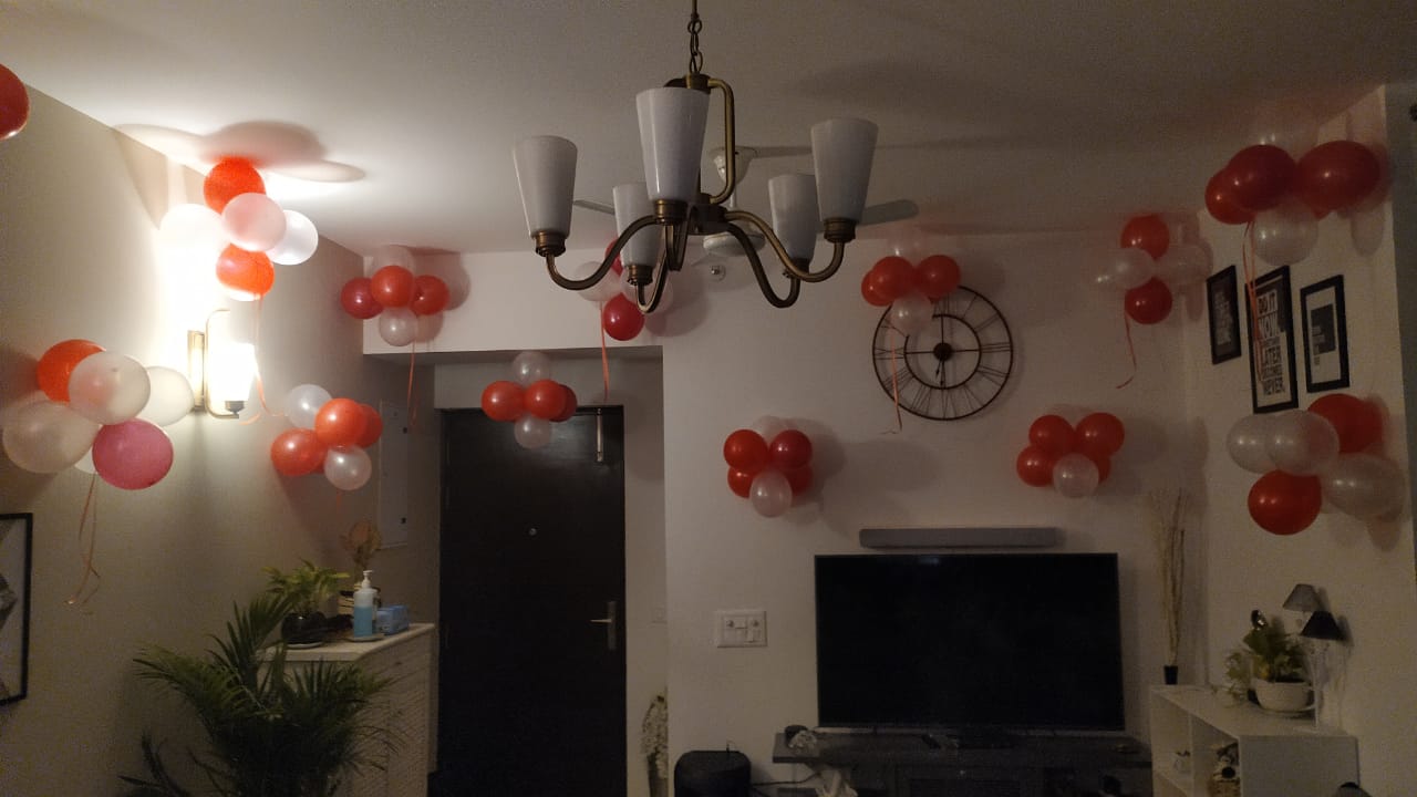 Love In The Air With Red & White Theme Balloons Decoration.