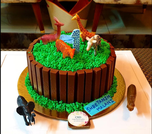 Black Forest Choco Chips With Animal Toy And KitKat. Give Your Loved Ones This Delicious Cake On The Special Day !